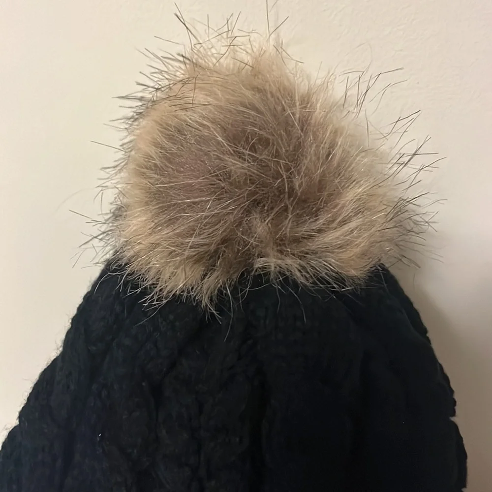 Timberland black cable knit, fleece lined hat with furry Pom on top, new